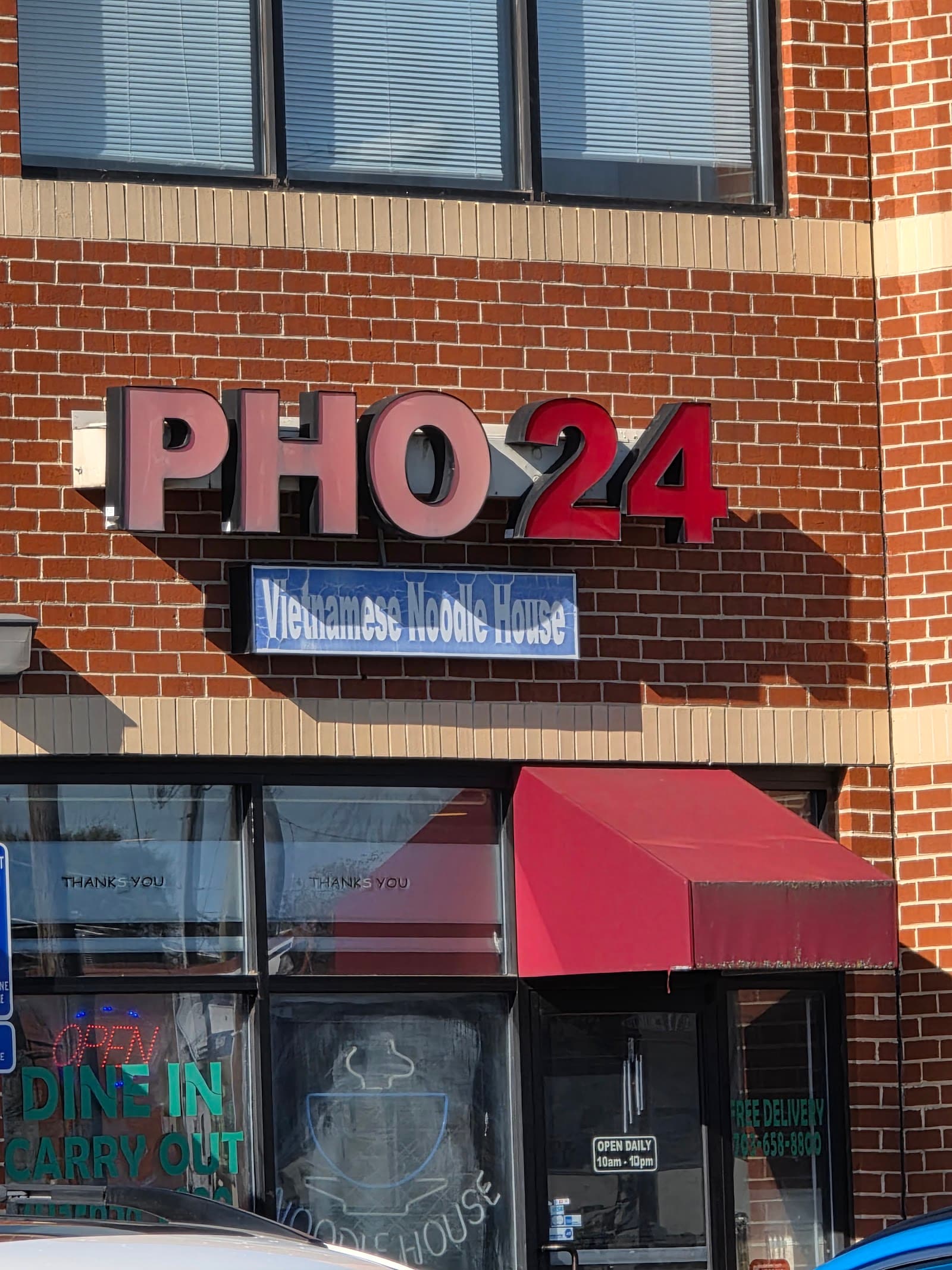Exterior storefront of Pho 24 on Annandale Road — the neighborhood pho destination since 2012